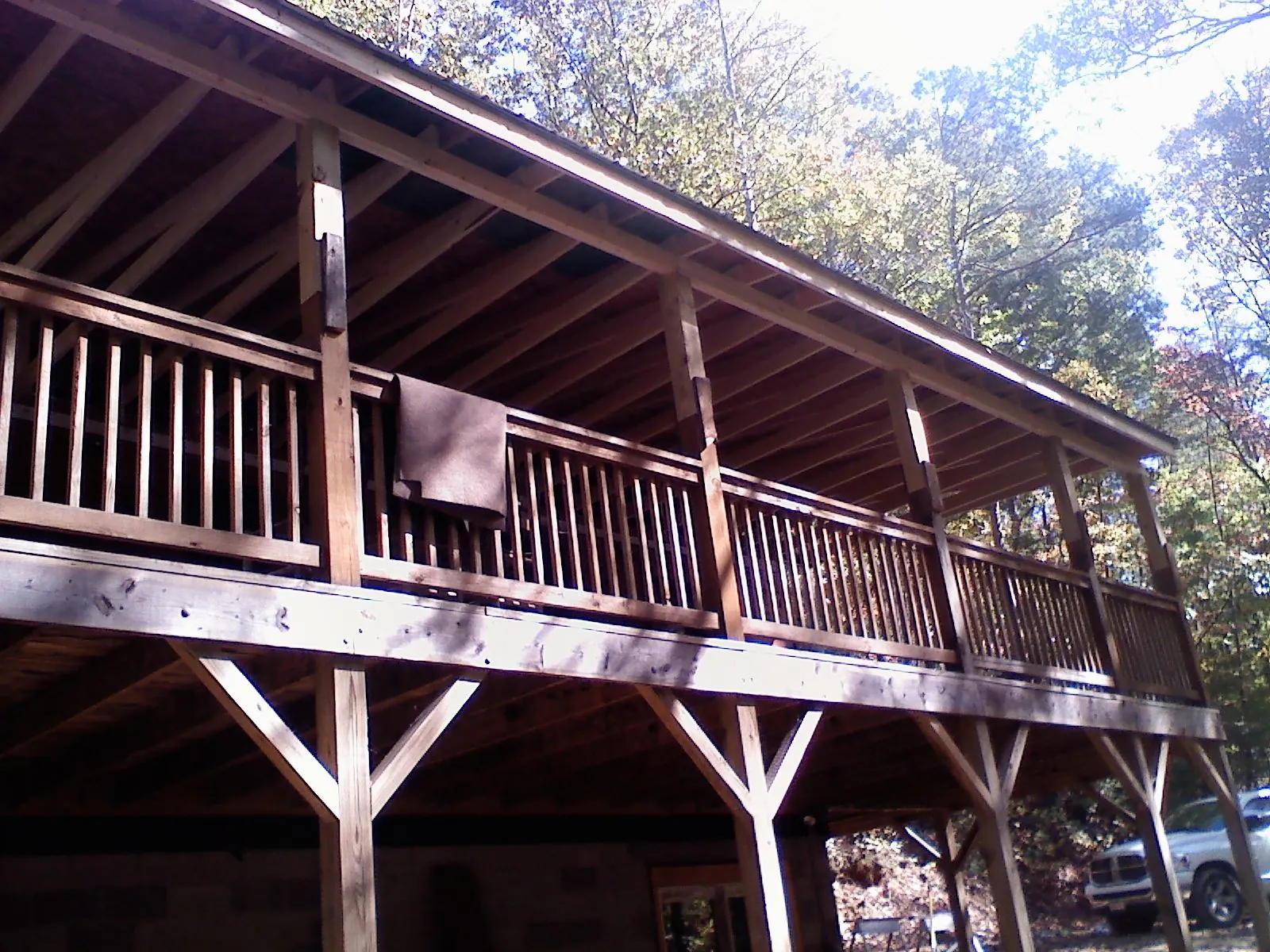 Timber framing under a new elevated porch and deck — Roof Leak Repair in El Reno by Roofing Brothers